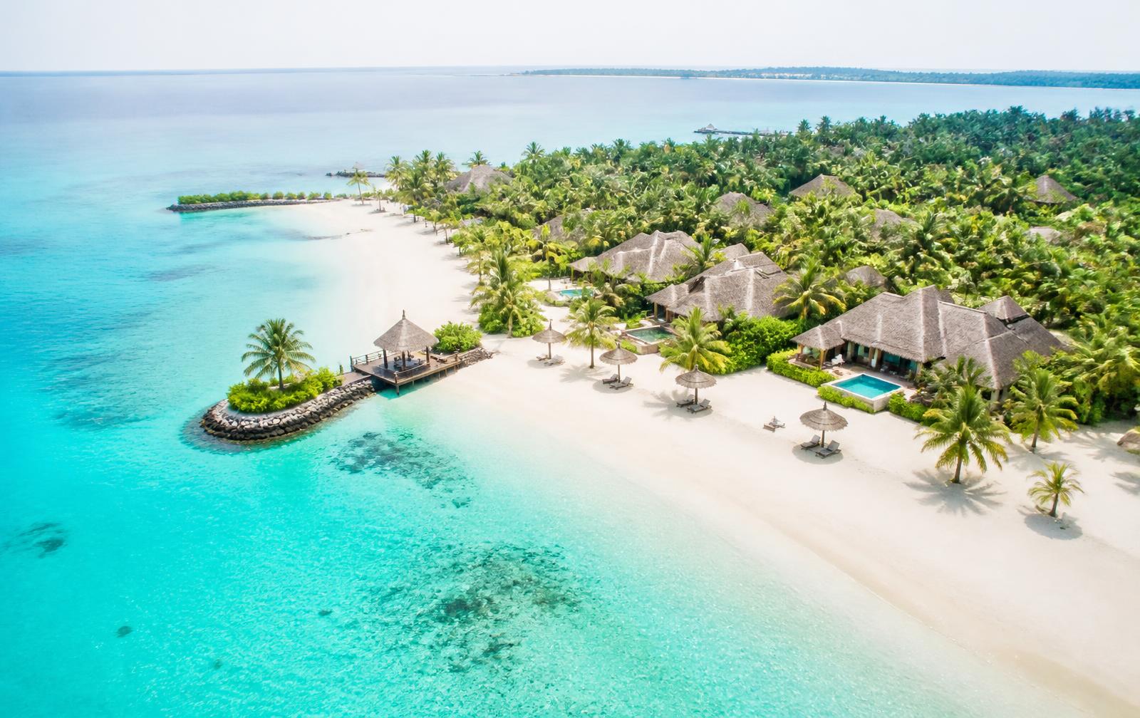 Aerial view of a bright tropical resort coastline